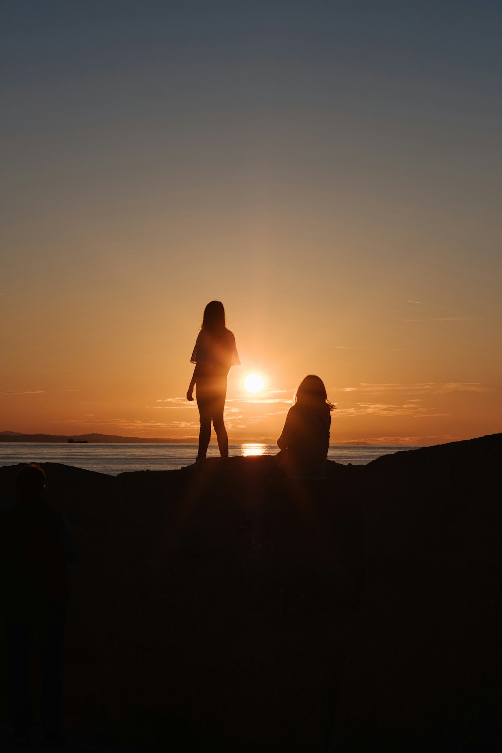 silhouette photography of two people
