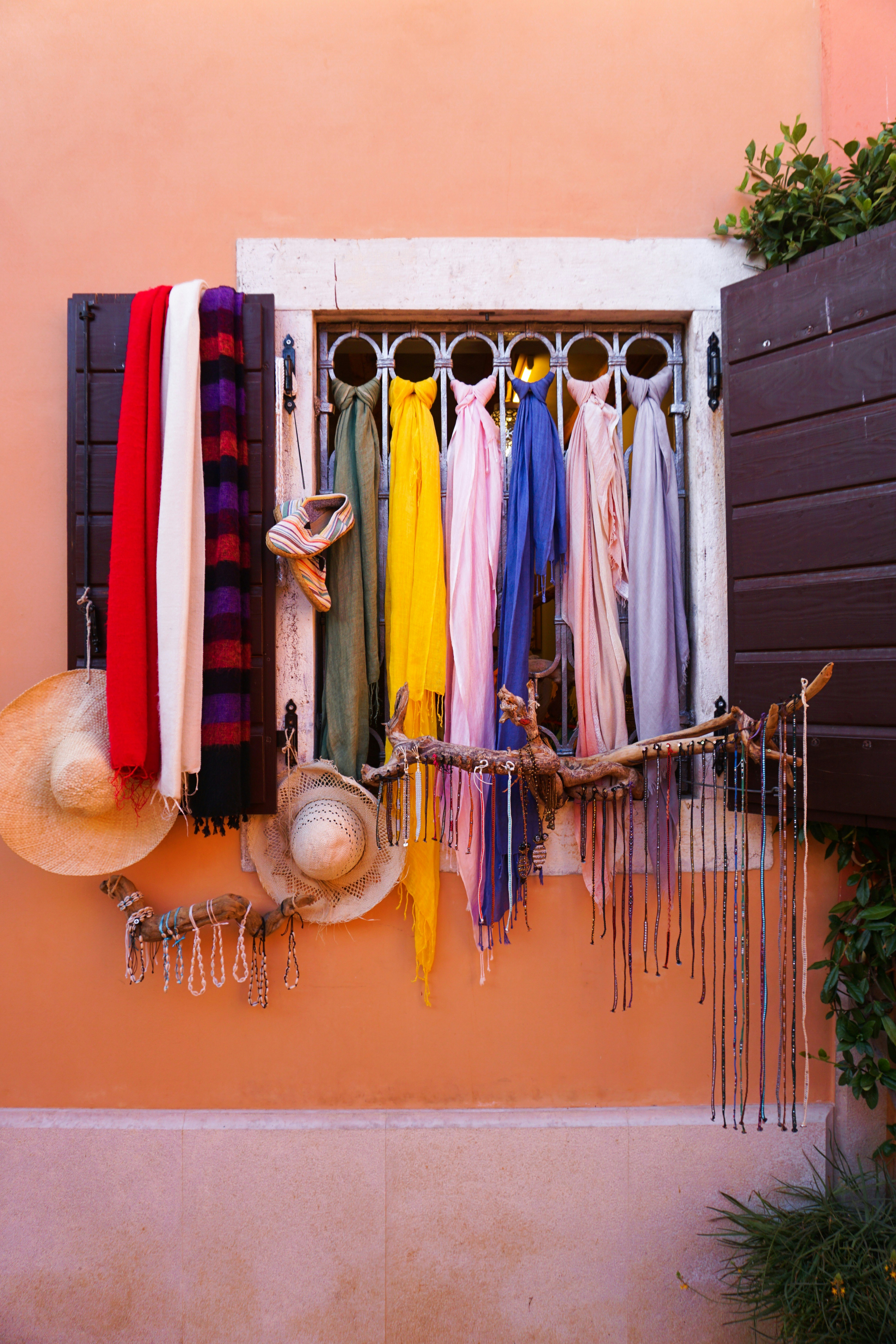 assorted color textile hanging on wall