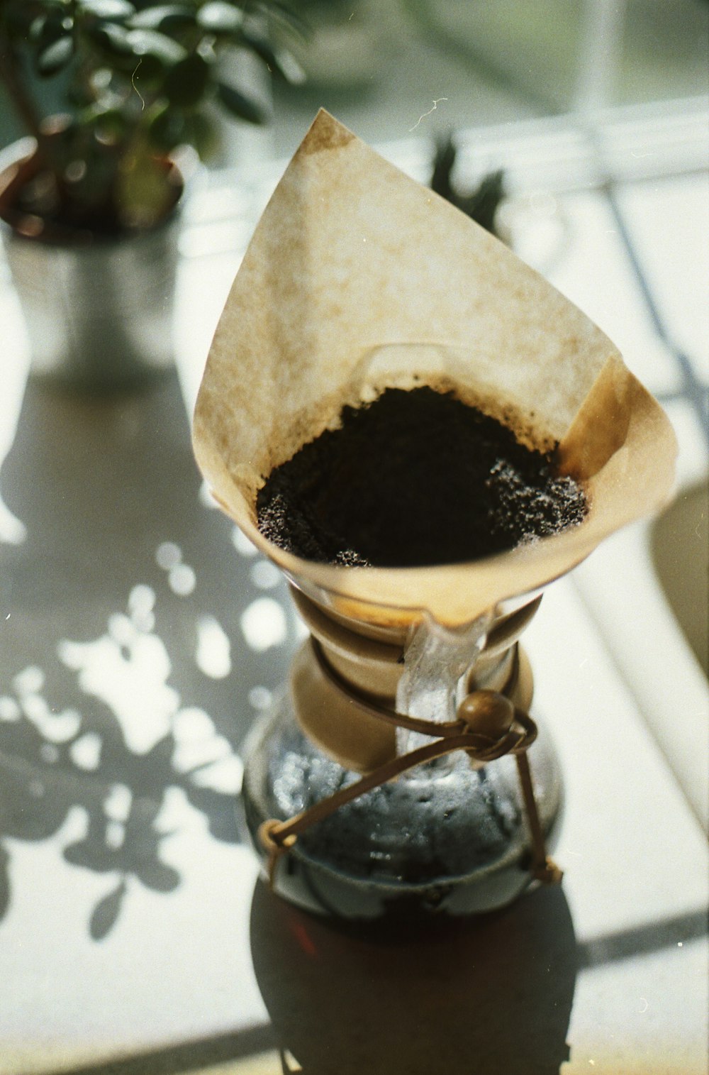 coffee grinder on white surface