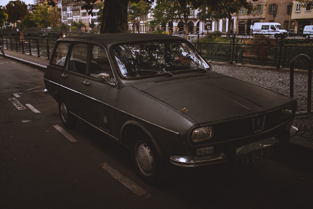 grayscale photo of black station wagon