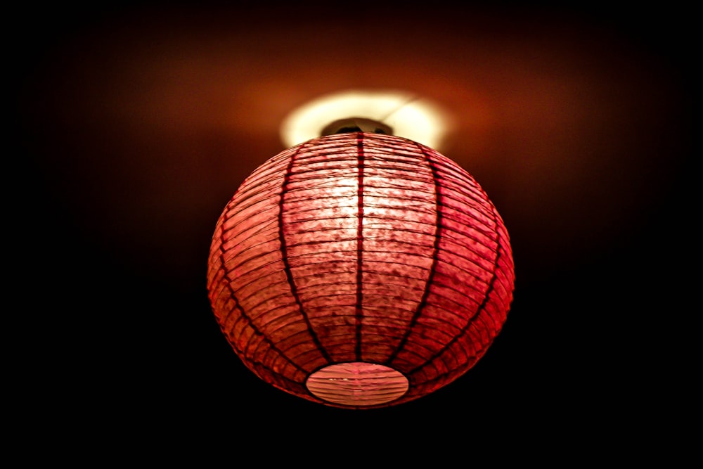 focus photo of red lamp
