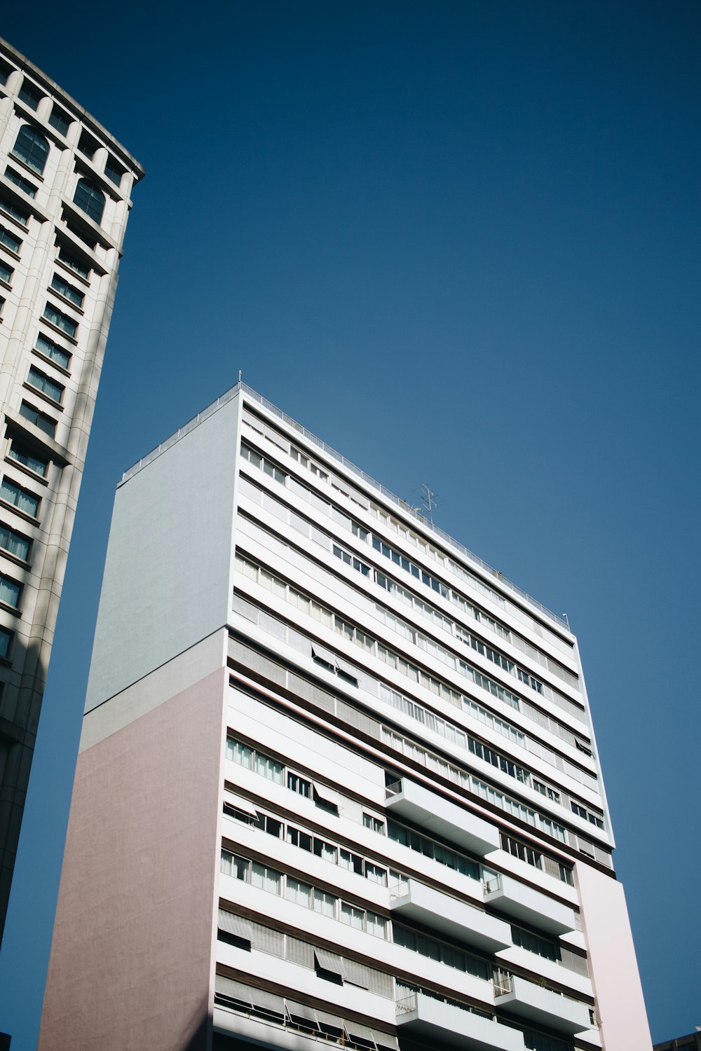 white high-rise building at daytime
