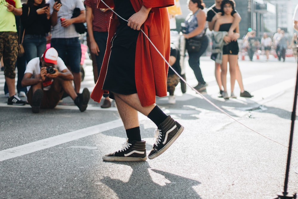 person holding white rope