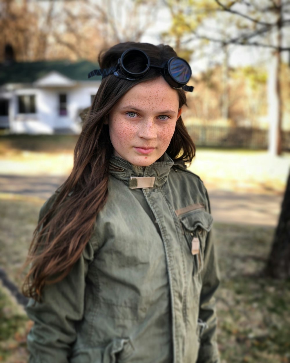 selective focus photography of woman in green jacket