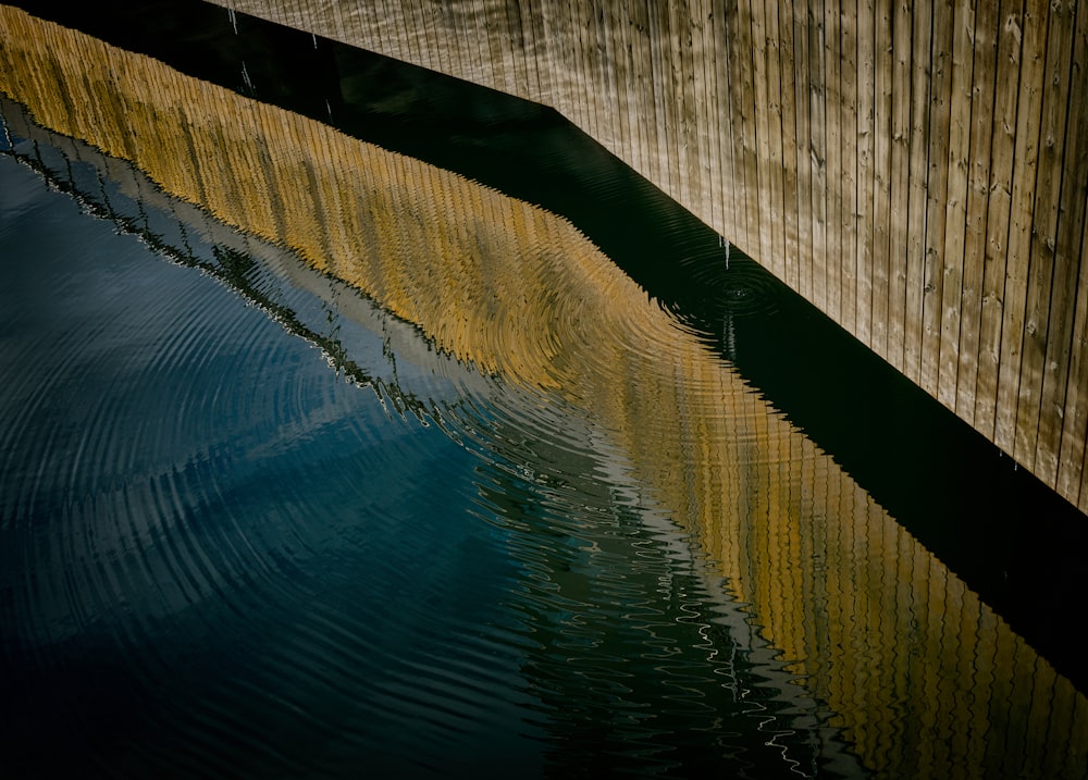 a wooden bridge over a body of water