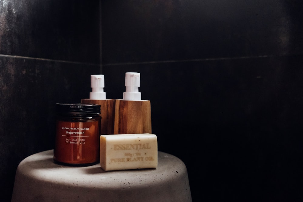 four toiletries on table