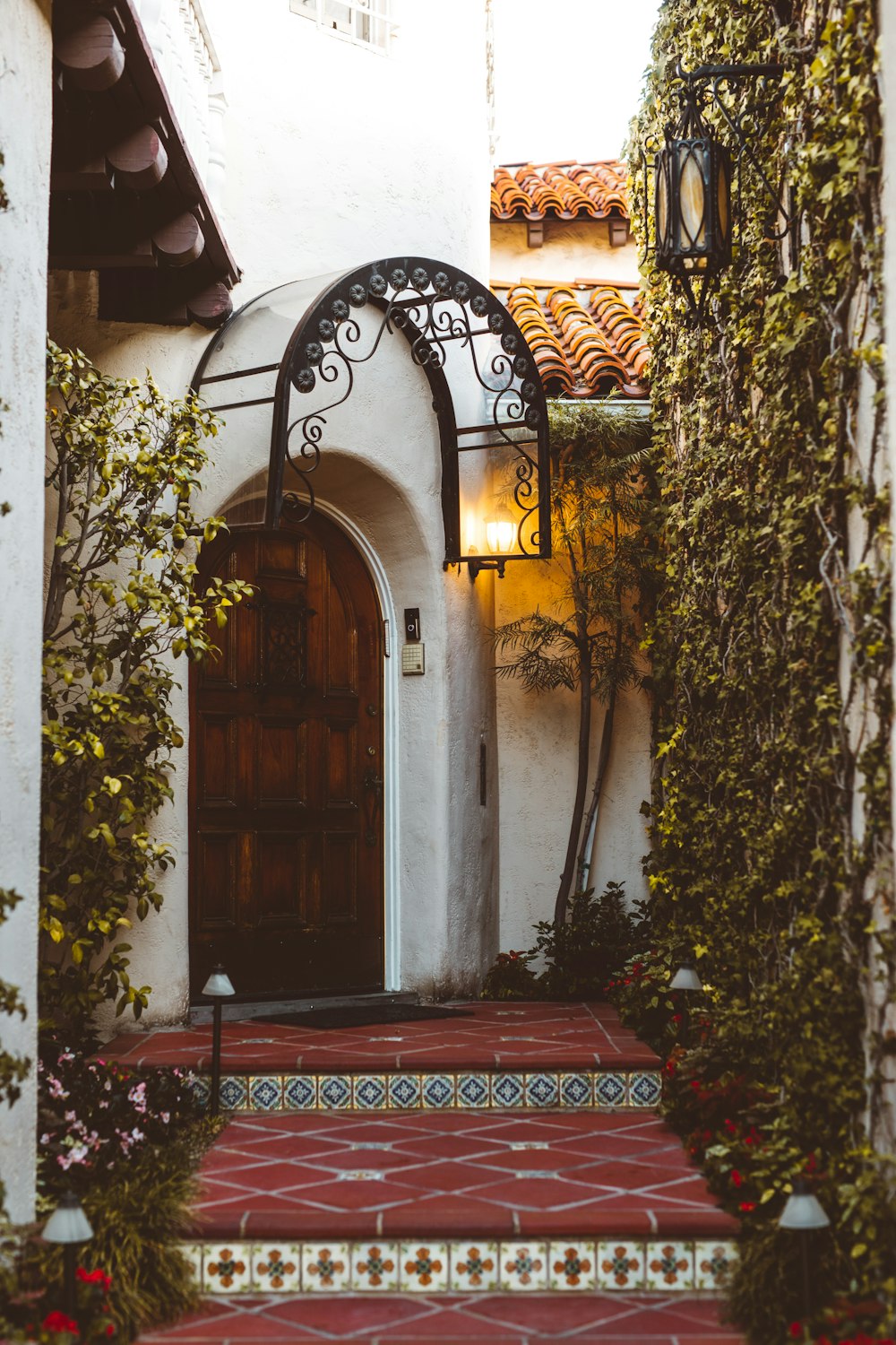 closed brown wooden door during daytime