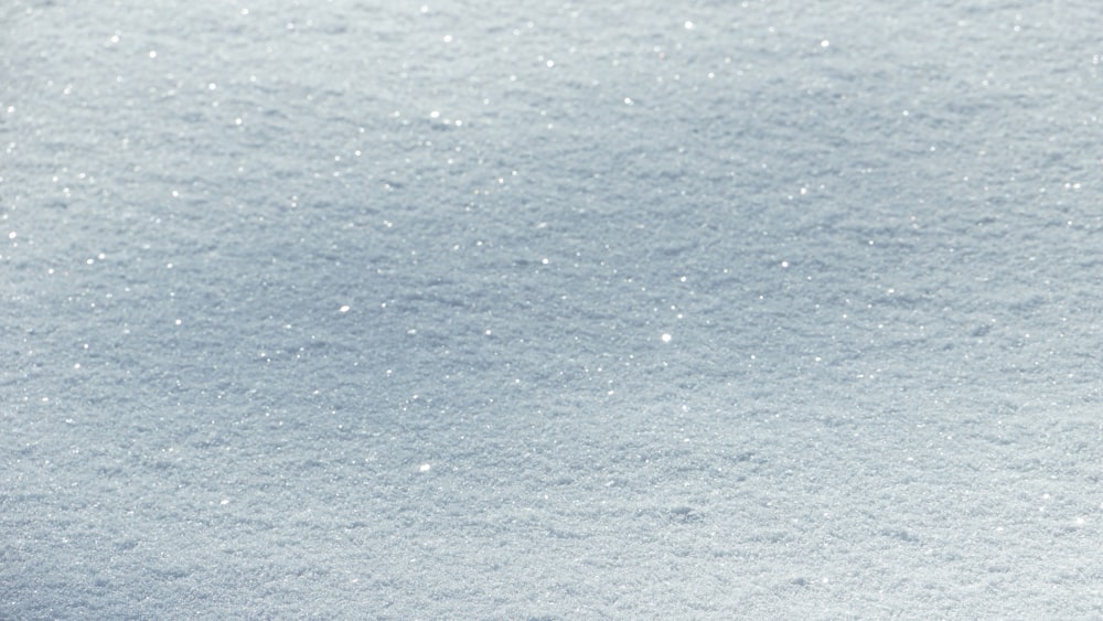 a close up of a snow covered ground