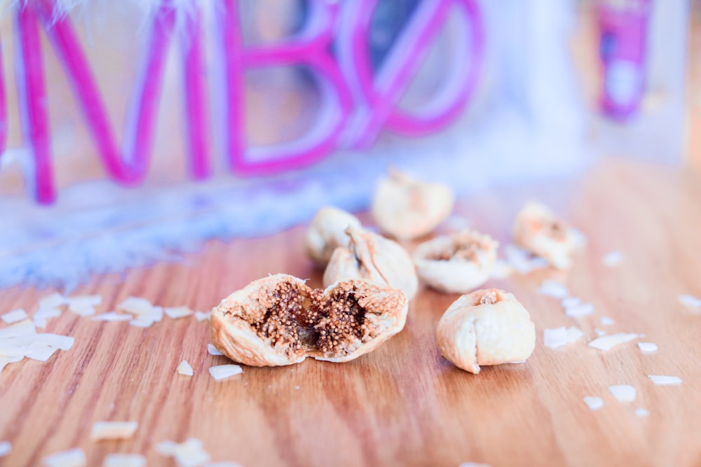 nuts on brown wooden tabletop