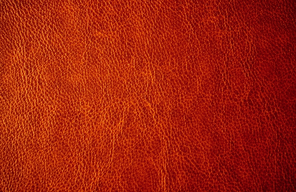 A close up of a red leather texture photo – Free Red Image on Unsplash