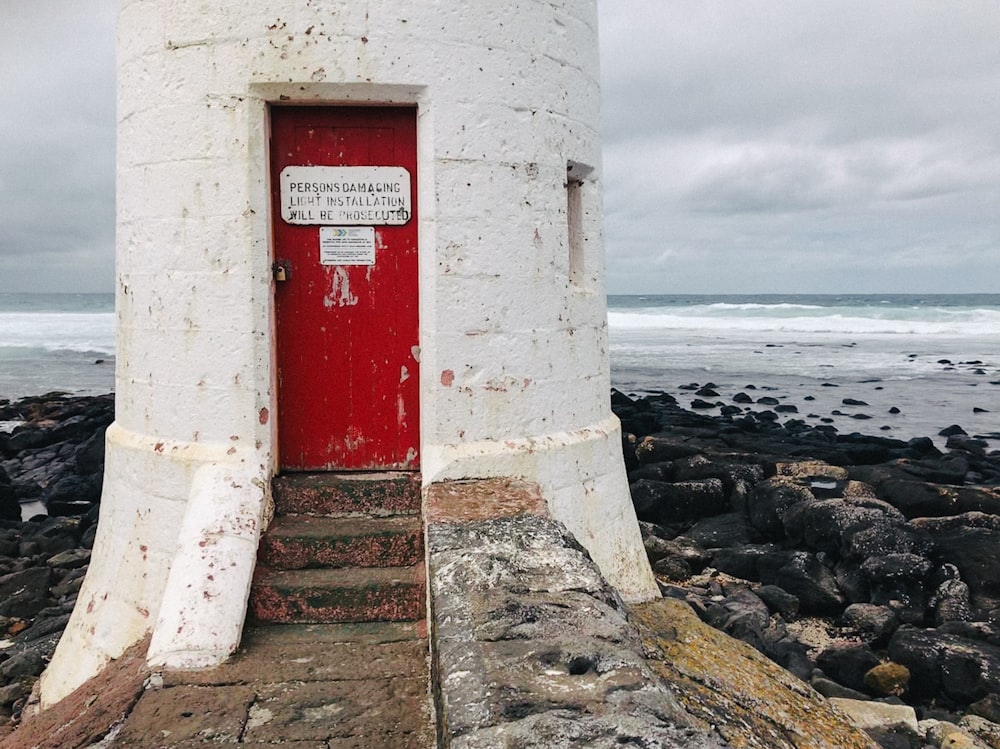 white and red lighthouse