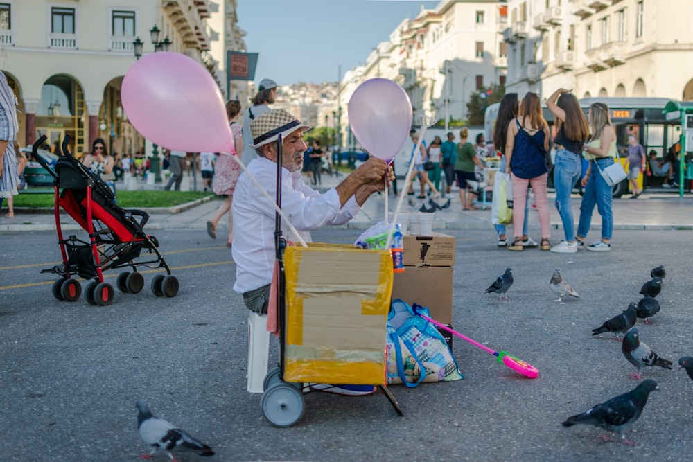 man holding balloon