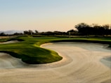 golf field under clear blue sky