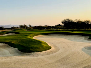 golf field under clear blue sky