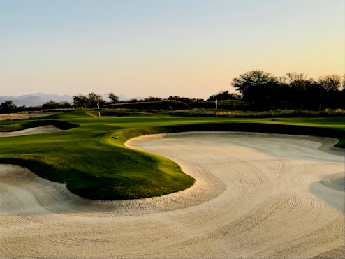 golf field under clear blue sky