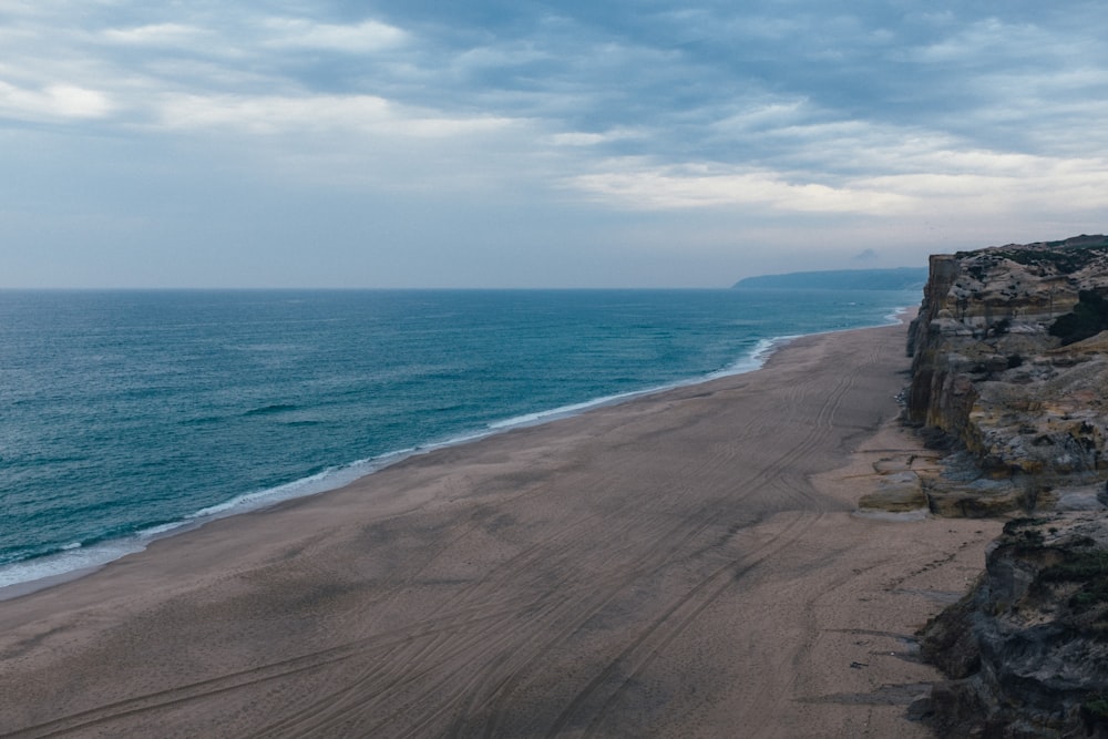 rock formation beside seashore