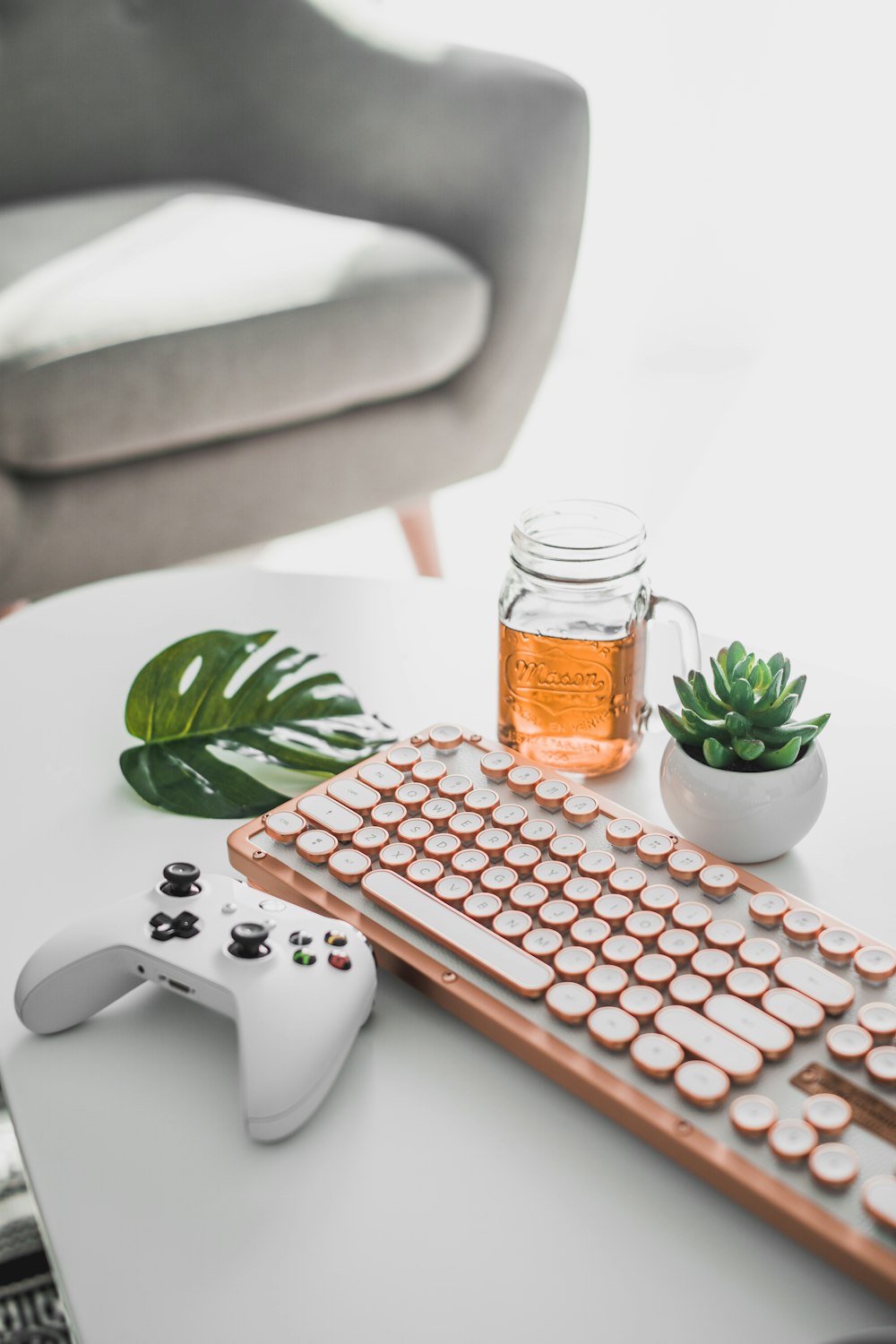 keyboard and game controller on table