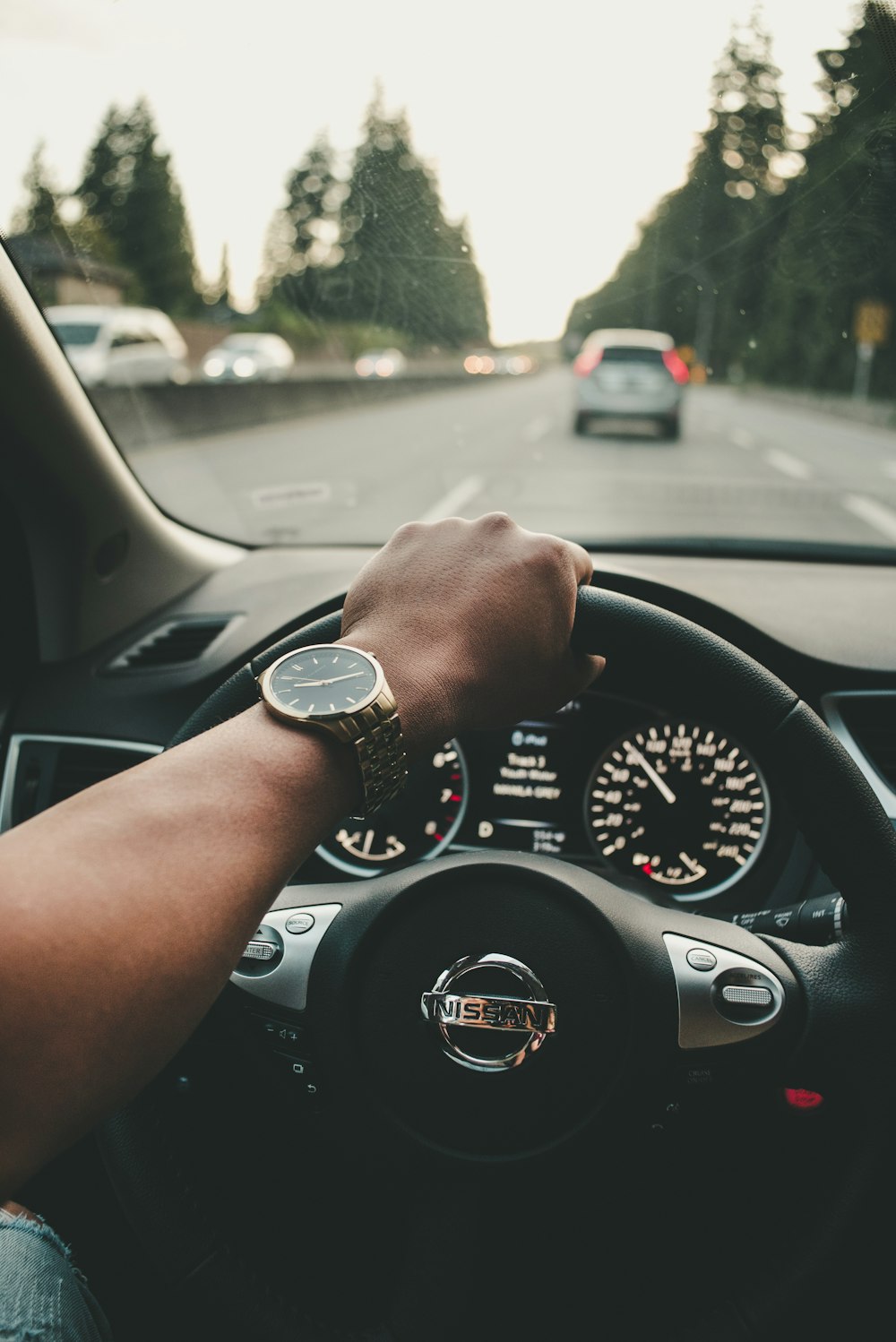 black Nissan steering wheel