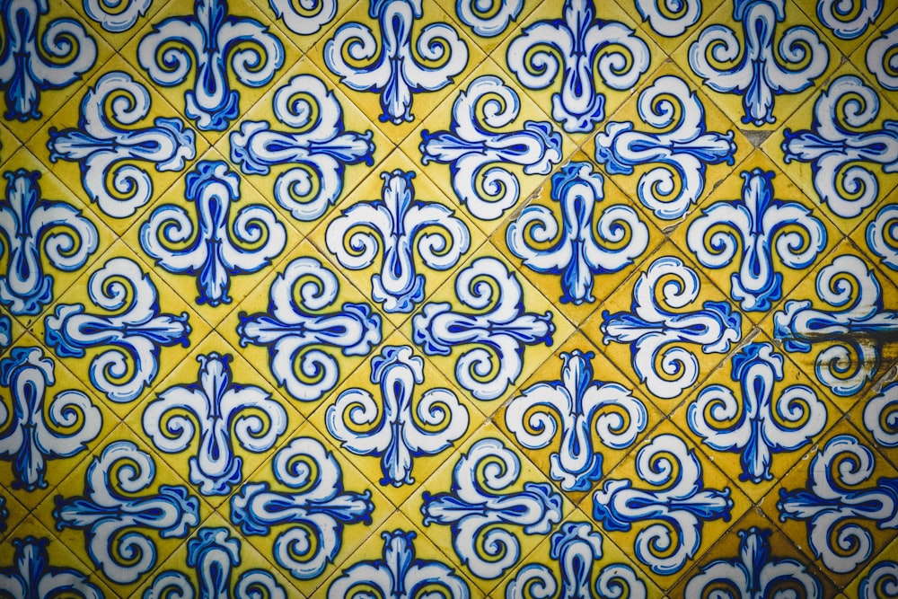 yellow, white, and blue floral textile