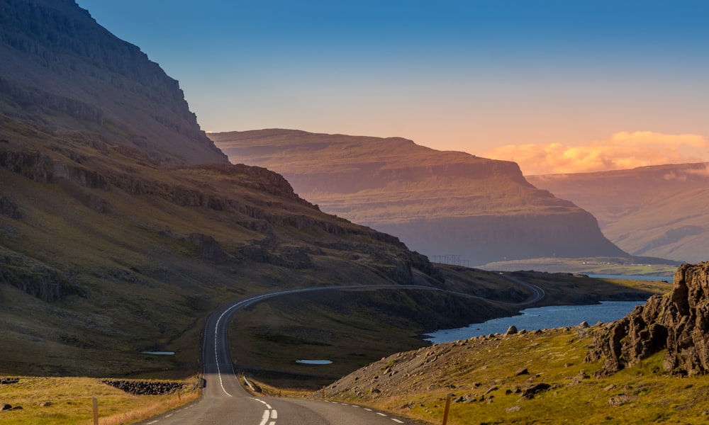 asphalt road near mountain