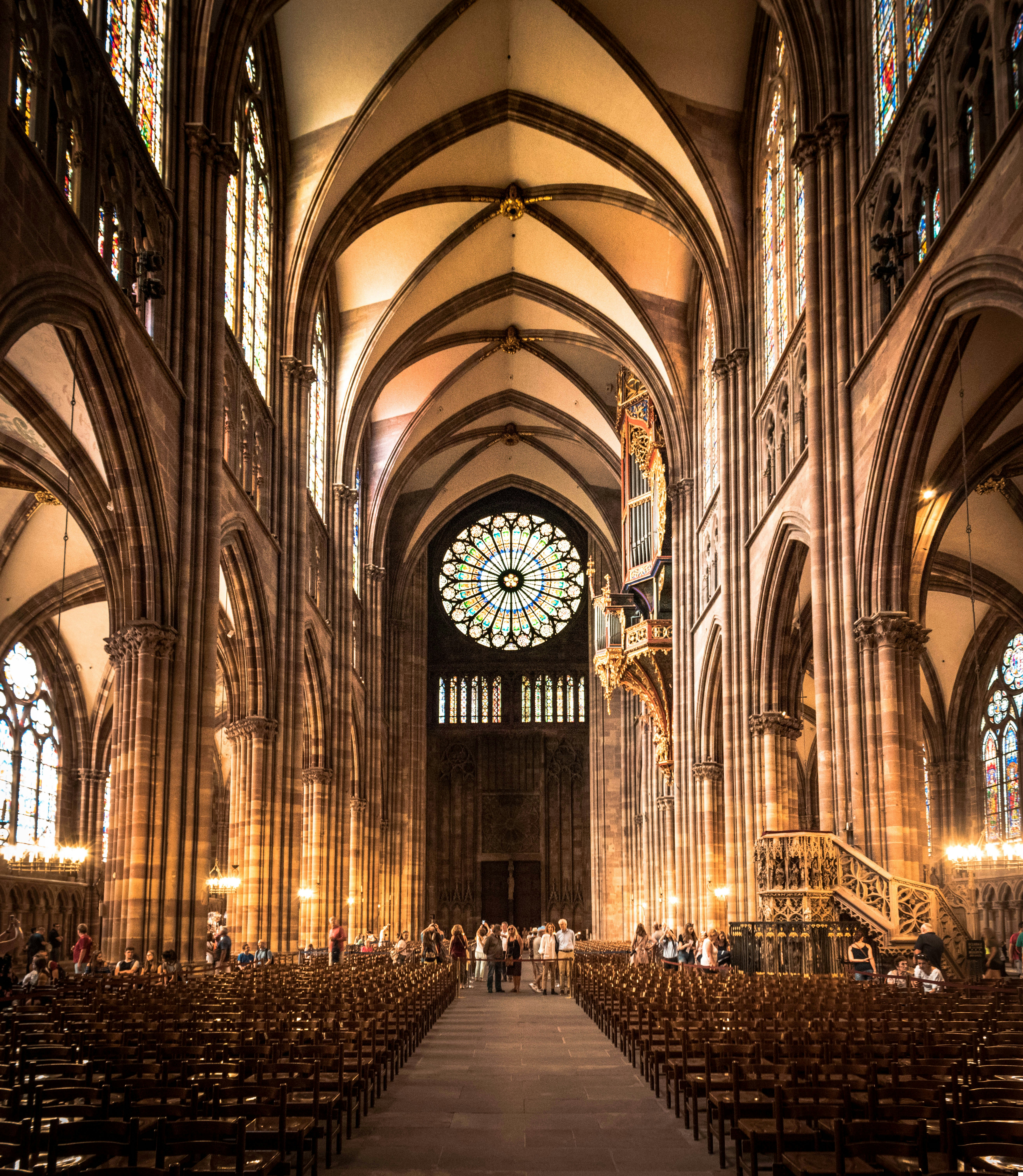 Person Inside Cathedral Photo Free Brown Image On Unsplash