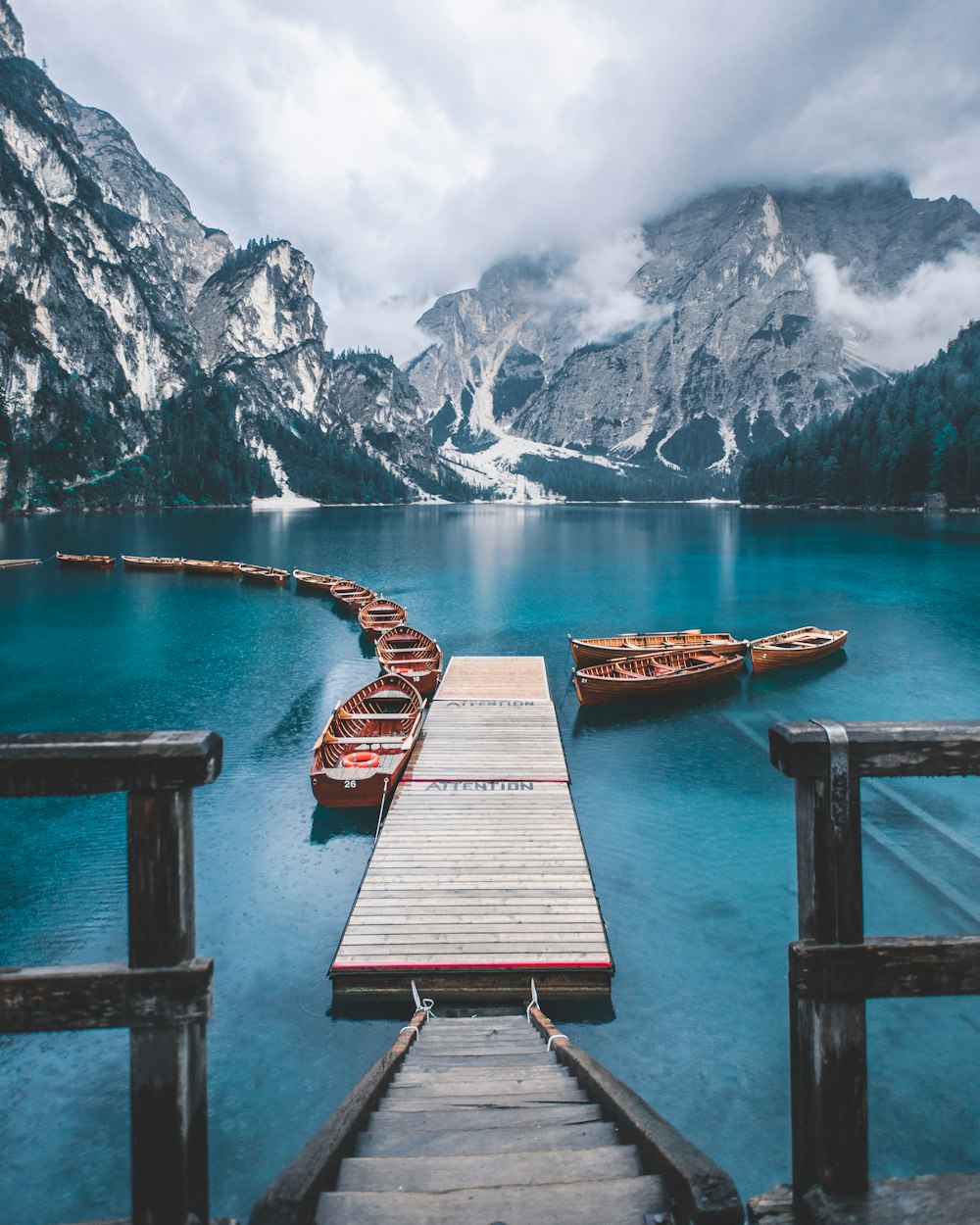 boat on body of water near mountains