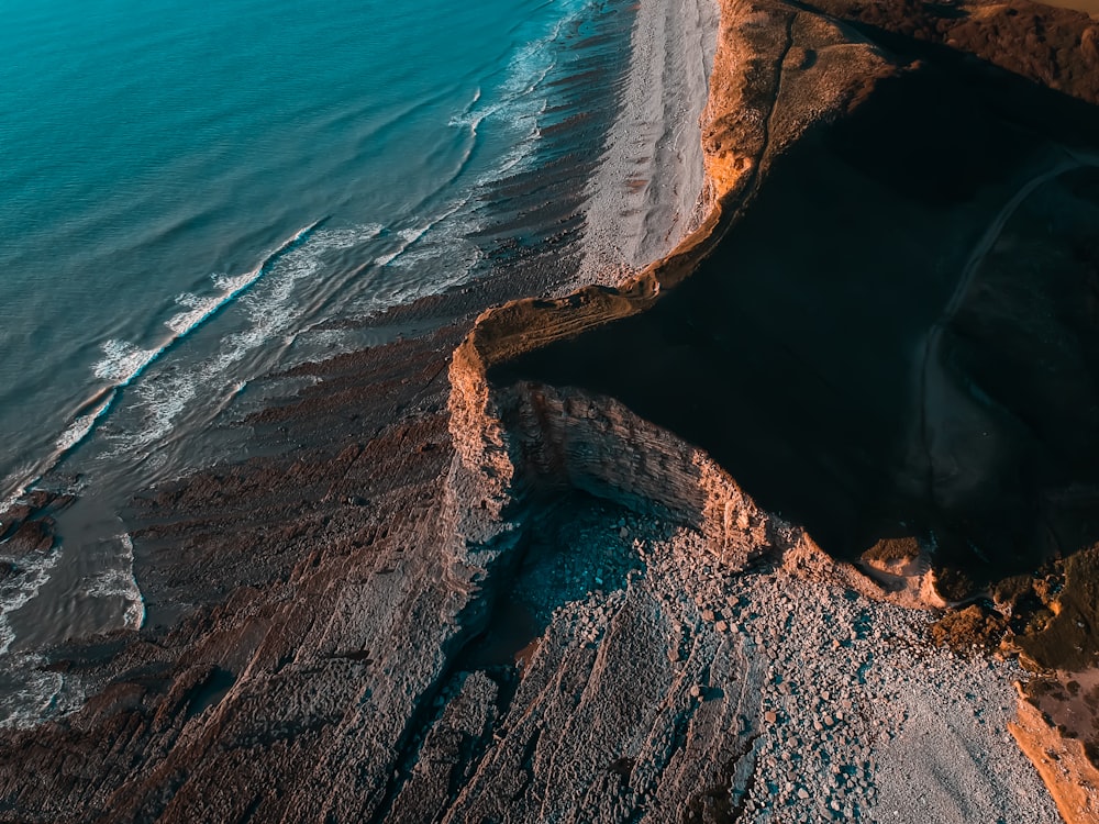 ocean waves under sunny sky