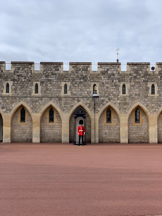 brown and beige concrete castle during daytime in Windsor Castle United Kingdom