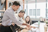 A dynamic team collaborating on a business project.