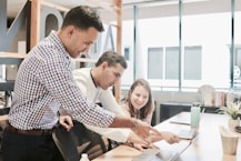 A dynamic team collaborating on a business project.