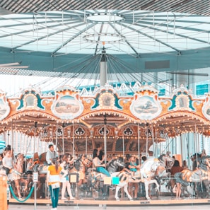 Children enjoying a colorful carousel ride at a recent community event.
