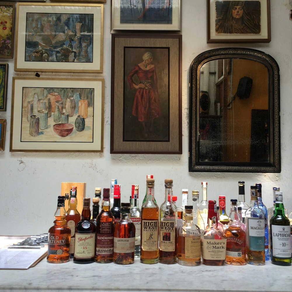 assorted-labeled bottles on table