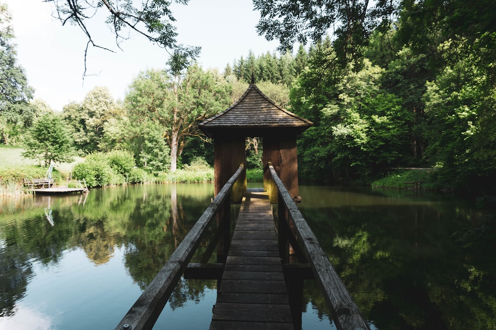 brown dock and shrine during daytime