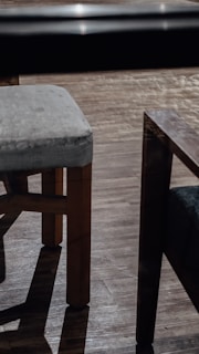 A chair with visible dust and stains next to the same chair looking fresh and clean