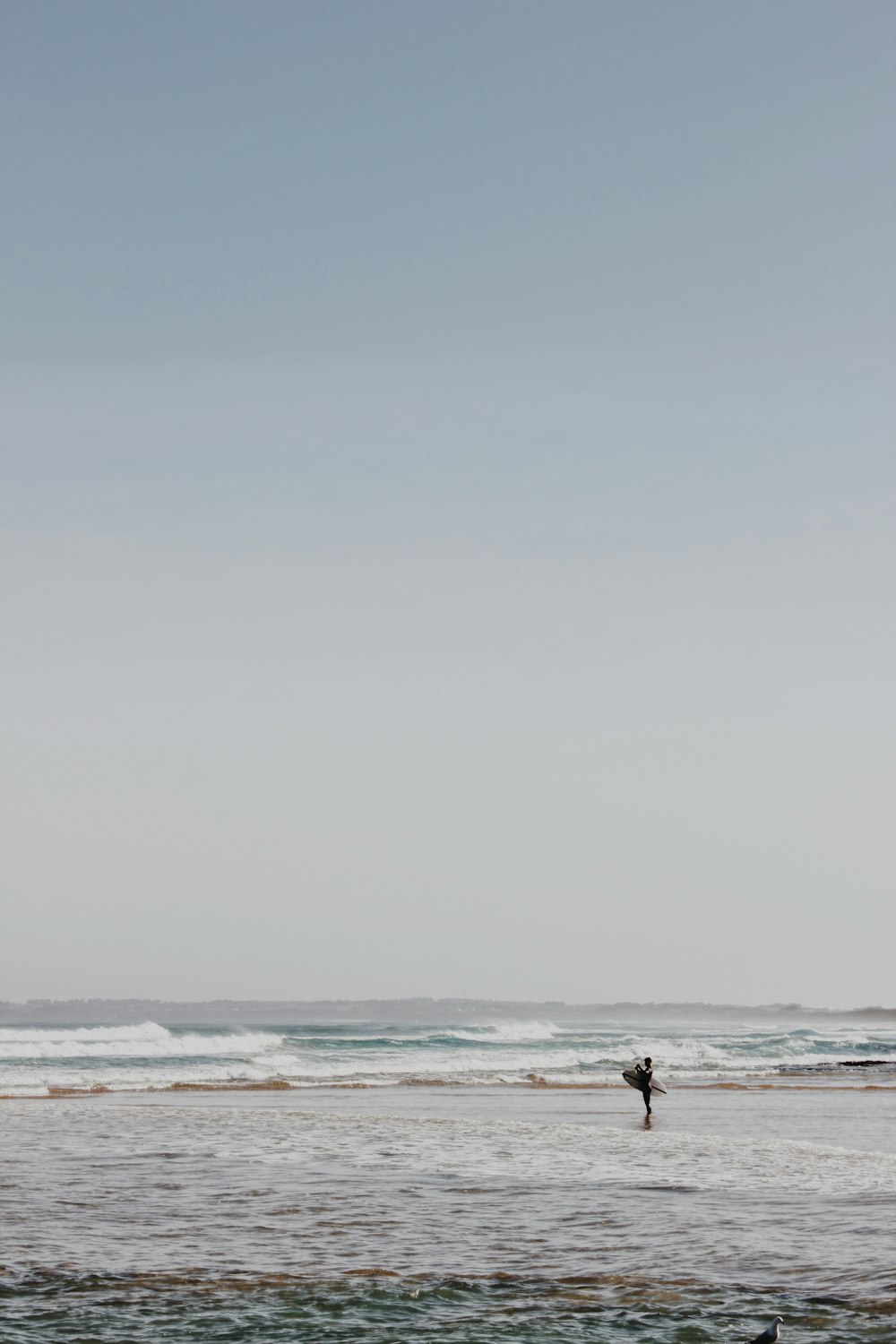 person standing on shore