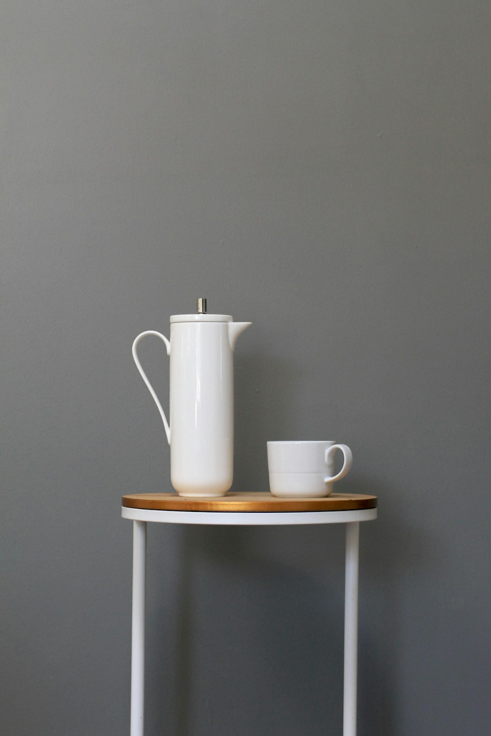 white ceramic teapot