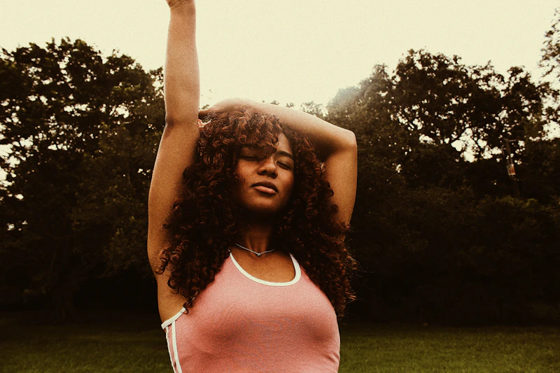curvy woman stretching while standing