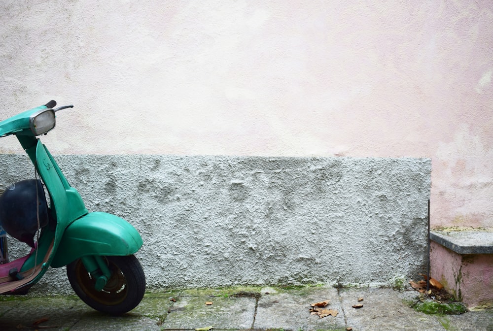 motor scooter near wall