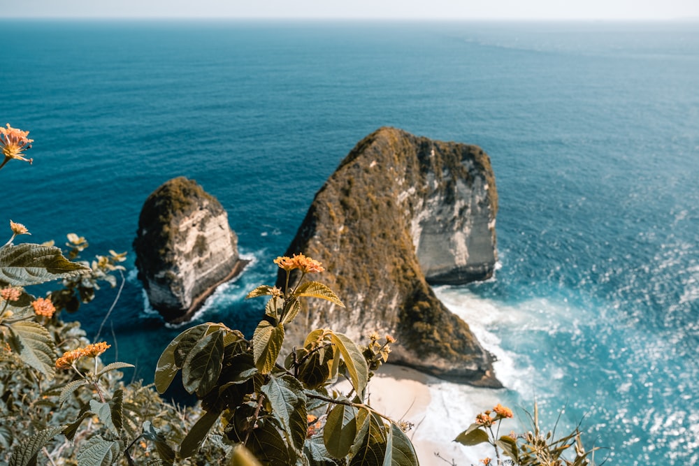 rock boulders beside ocean