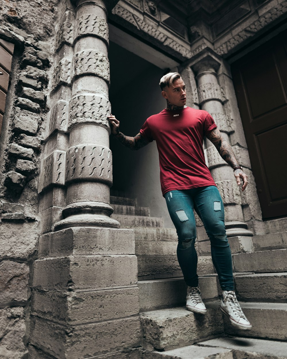 man standing in front of stair