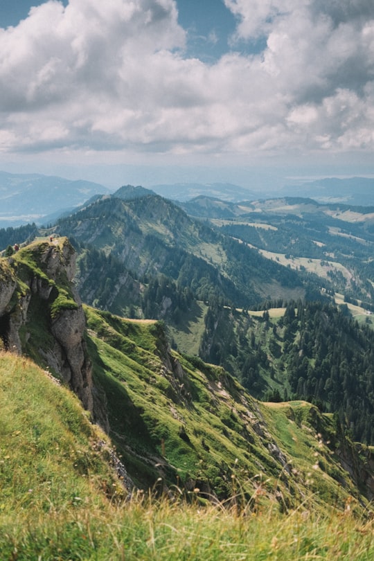 peak of mountain under white and blue cloudy sky in Hochgrat Germany