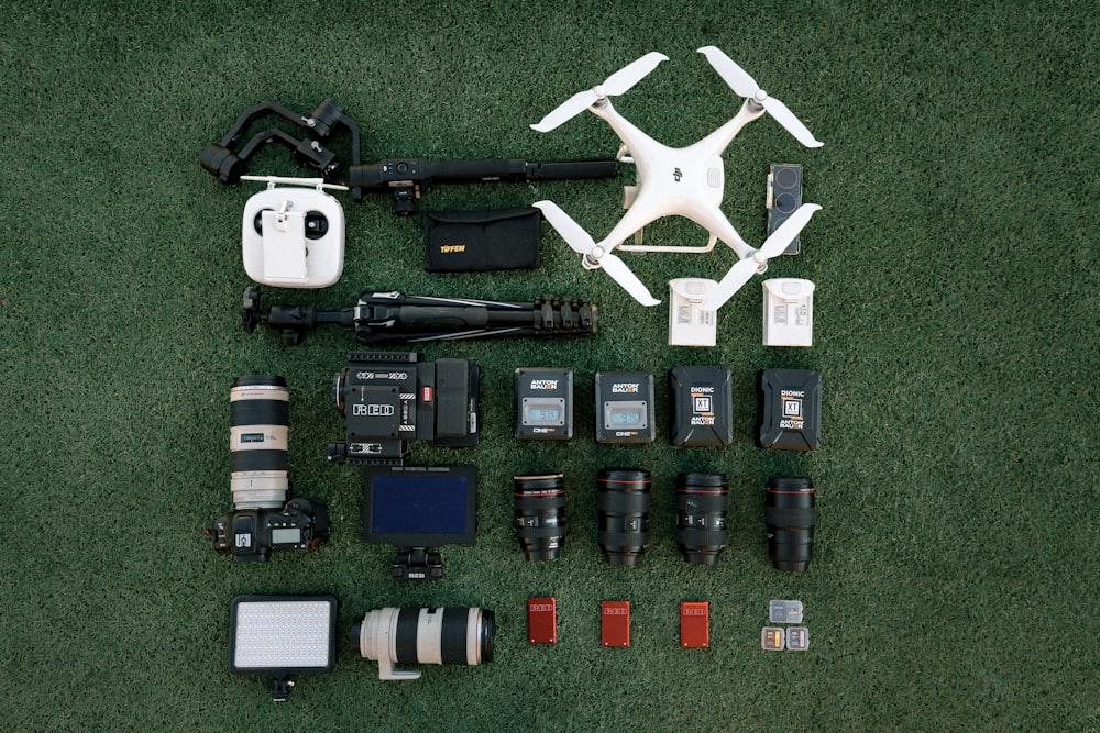 white quadcopter drone with DSLR camera set