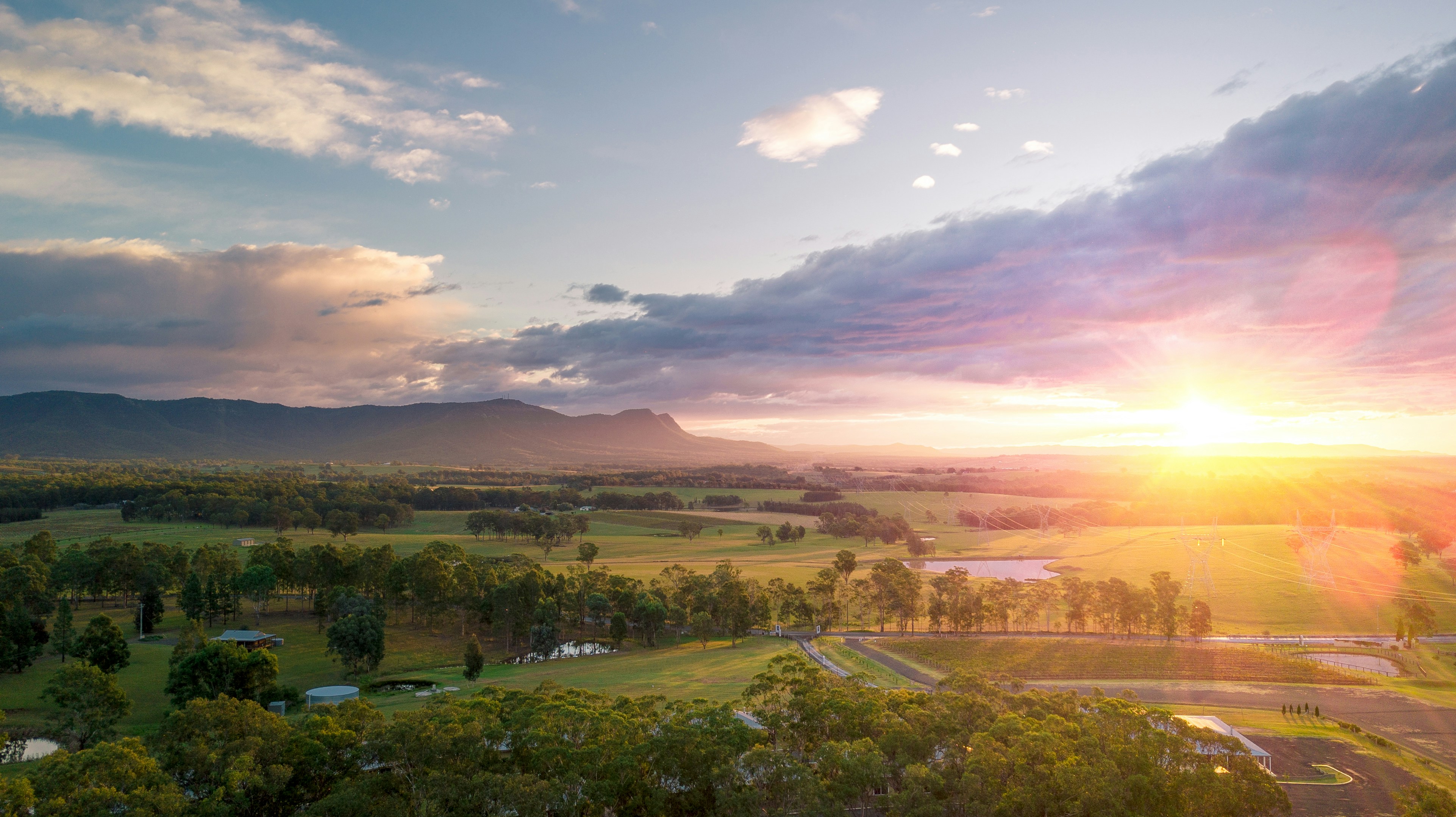 I have an app on my phone to alert me to when golden hour starts and while at my brother’s bucks party, I was on a bus back from a winery when Golden Hour was landing. As soon as we got back to the accommodation, I jumped out, grabbed the DJI Mavic Pro and launched it. Moments later I grabbed this shot. Was well worth the effort to grab it.