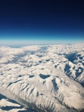 aerial photography of fault-block mountain covered with snow
