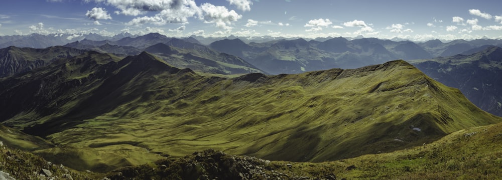 landscape photography of green mountain at daytime