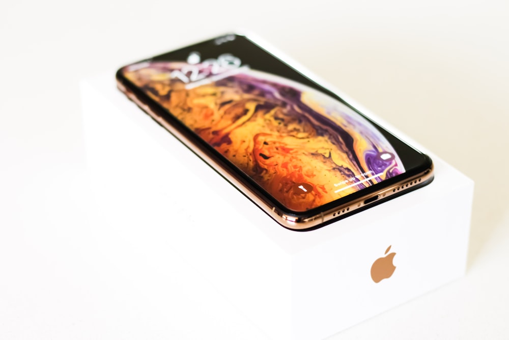 gold iPhone Xs with box