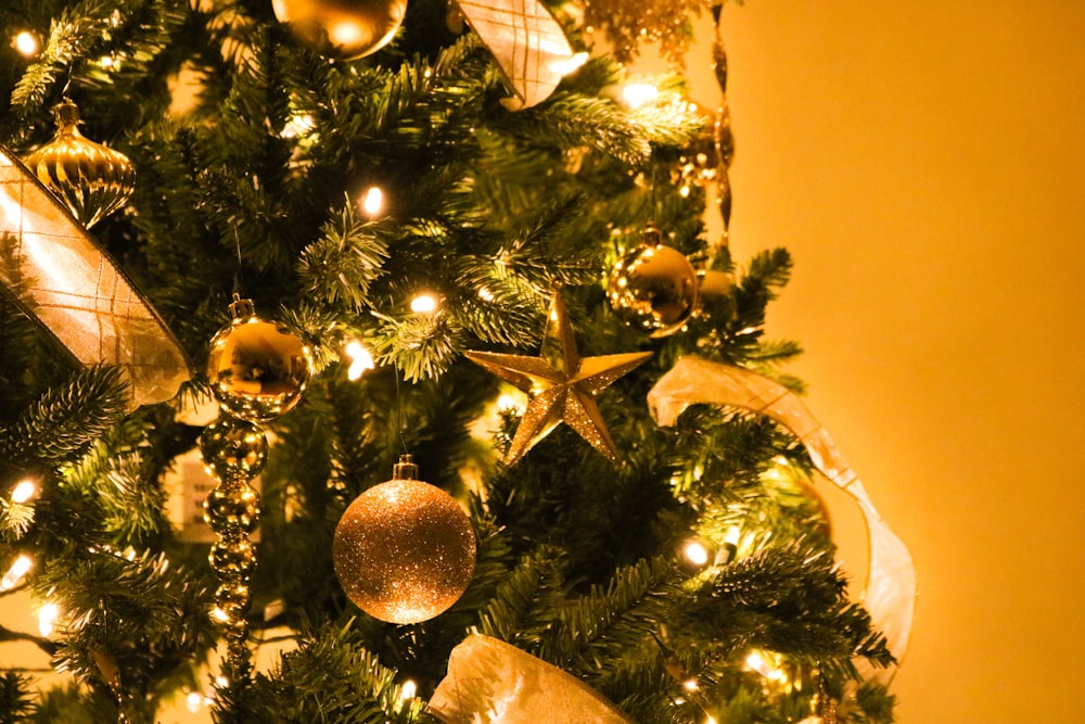 green Christmas tree with gold decorations