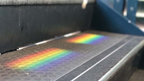 Photo of a Smart Grip technician applying anti-slip treatment to a busy commercial walkway.