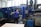 An engineer working on an industrial automation system in a factory setting.