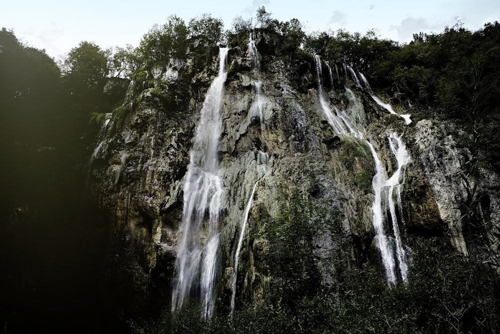 time lapse photography of waterfalls